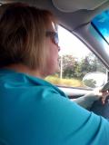Diane driving to airport